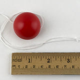 Jest In Time Clown Noses are made of a deep red soft plastic. The comfortable red 1 1/2" half sphere with elastic string fits all adults, all kids 2 years & up, all nationalities & all different types of noses. It doesn't fall off! 