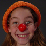 Jest In Time Clown Noses are made of a deep red soft plastic. The comfortable red 1 1/2" half sphere with elastic string fits all adults, all kids 2 years & up, all nationalities & all different types of noses. It doesn't fall off! Click on the picture to the left for more detailed views. To order select the quantity needed from drop down menu.