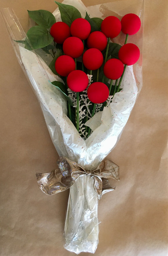 For the romantic funny people.  Say I love you, with a Dozen Long Stem Noses.  This bouquet is long lasting, and never needs watering.  We have included a couple extra foam noses to wear on a special occasion.  We will customize a note to the one you love.  (Your bouquet may be slightly different than pictured)